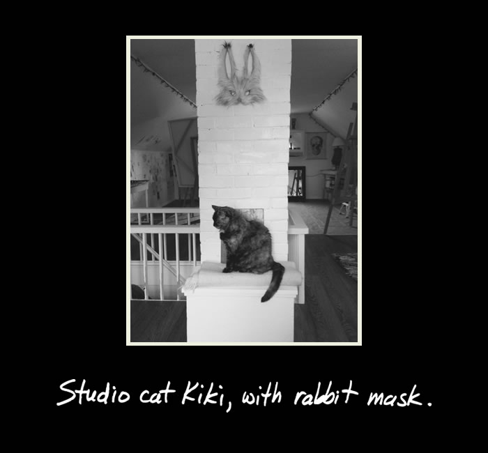 Studio cat Kiki with rabbit mask